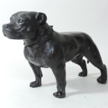 A reproduction bronze model of a Staffordshire Bull Terrier,