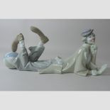 A Lladro porcelain figure of a reclining clown,
