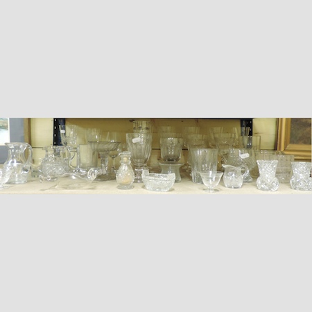A shelf of mainly 19th century glassware,