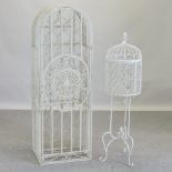 A cream painted iron wine rack, 46cm,