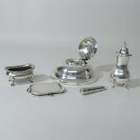 A collection of silver to include an inkwell, 6cm tall, a photograph frame, cheroot holder,