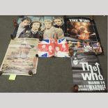 A poster of the Who, unframed, 86 x 58cm, together with three others,