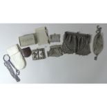 An early 20th century white metal mesh ladies evening bag, together with similar purses,