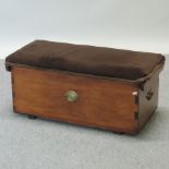 A small Victorian pine and brown upholstered trunk,