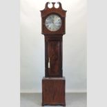 A Victorian mahogany and boxwood strung, cased eight day longcase clock, with a silvered dial,