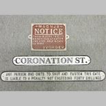 A red painted cast iron sign, together with a Coronation Street sign, 63cm,