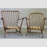 A pair of Ercol spindle back arm chairs
