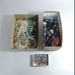 Two boxes of costume jewellery,