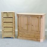 A modern pine two door cabinet, with a single drawer below, 107cm, together with a pine chest,