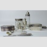 A collection of silver items to include a table cigarette box, 9cm, a trinket box, cigarette case,