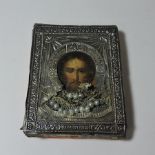 A Russian icon, with a white metal surround,