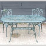 A green painted metal garden table, 140 x 82cm,