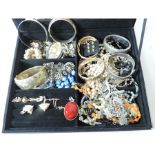 A collection of costume jewellery, to include bangles,