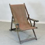 An early 20th century teak deck chair