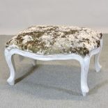 A crushed velvet footstool,