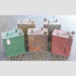 A collection of five vintage petrol cans