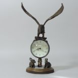 A reproduction glass ball clock, surmounted by an eagle,