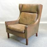 A 1960's Danish green leather upholstered armchair,