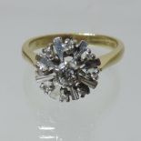 An 18 carat gold diamond cluster ring,