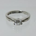 A platinum and diamond solitaire ring,