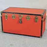 A mid 20th century red cabin trunk,