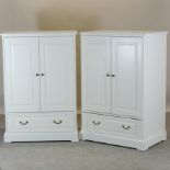 A modern white wardrobe, of small proportions, together with another,