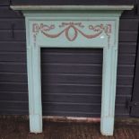 A painted cast iron fire surround,