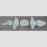 A reconstituted stone alligator, in five sections,