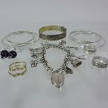 A collection of silver ladies jewellery, to include a charm bracelet,