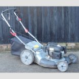 A Rhyas self-propelled petrol lawn mower