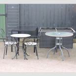 A metal and glass top garden table, together with a tile top table, two matching chairs,