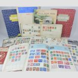 A collection of five stamp albums, to include all world stamps,