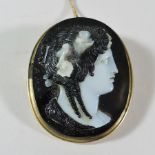 An early 20th century carved agate cameo brooch,