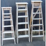 A wooden step ladder, 154cm tall,