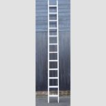 An aluminium ladder, in two sections,