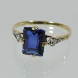 An 18 carat gold sapphire single stone ring,