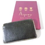 An Asprey silver mounted leather wallet,