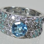 An 18 carat white gold diamond and topaz ring, by Links of London,