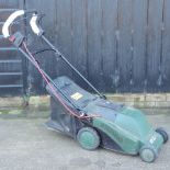 An Atco Richmond 36 rotary cordless electric lawn mower