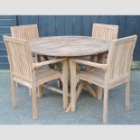 A teak circular garden table, 120cm,