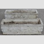 A pair of reconstituted stone rectangular planters,