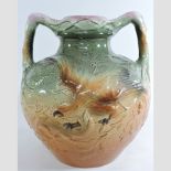 An early 20th century majolica twin handled vase,