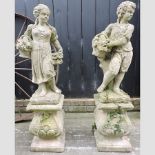 A pair of reconstituted stone garden statues, on plinth bases,