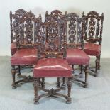 A set of six 19th century carved oak dining chairs,
