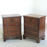 A pair of reproduction mahogany bedside chests,