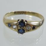 An 18 carat gold and sapphire ring