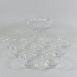 A set of cut glass dishes,