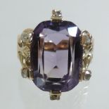 An 18 carat gold amethyst and diamond ring,