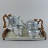 A Picquot ware stainless steel tea set,