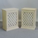 A pair of cream painted side cupboards, with lattice doors,